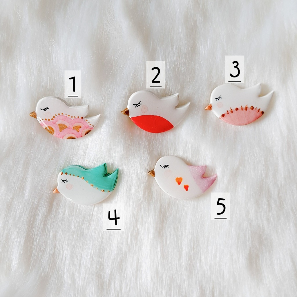 Broche oiseau poète