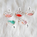 Broche oiseau poète