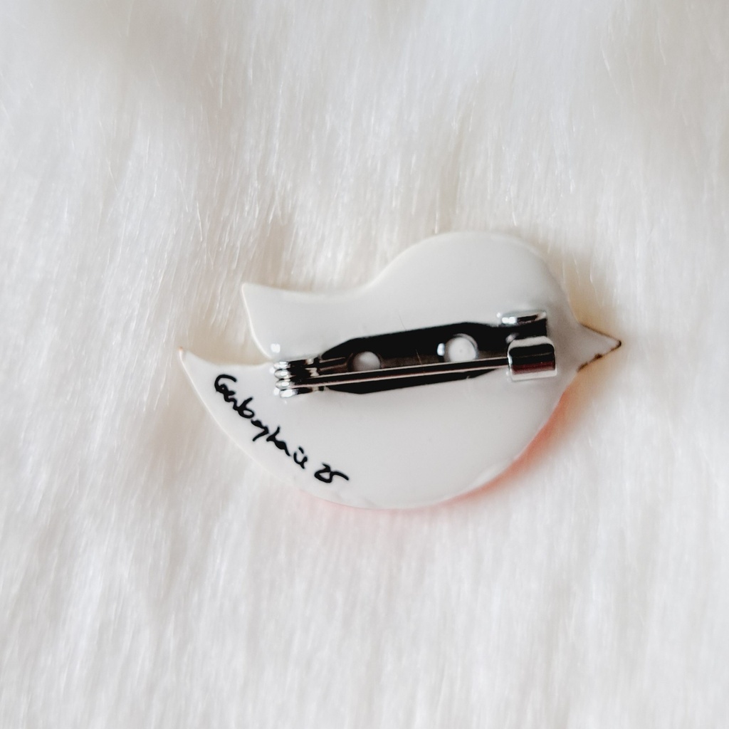 Broche oiseau poète