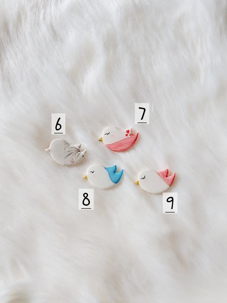 Broche oiseau poète