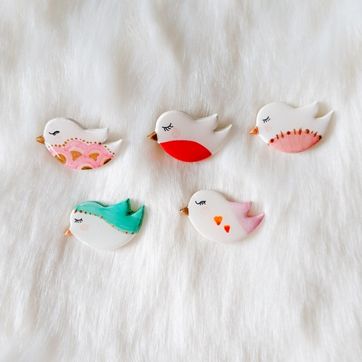 Broche oiseau poète